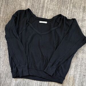 We The Free Black Waffle Knit Sweatshirt fits blousy and comfortable.